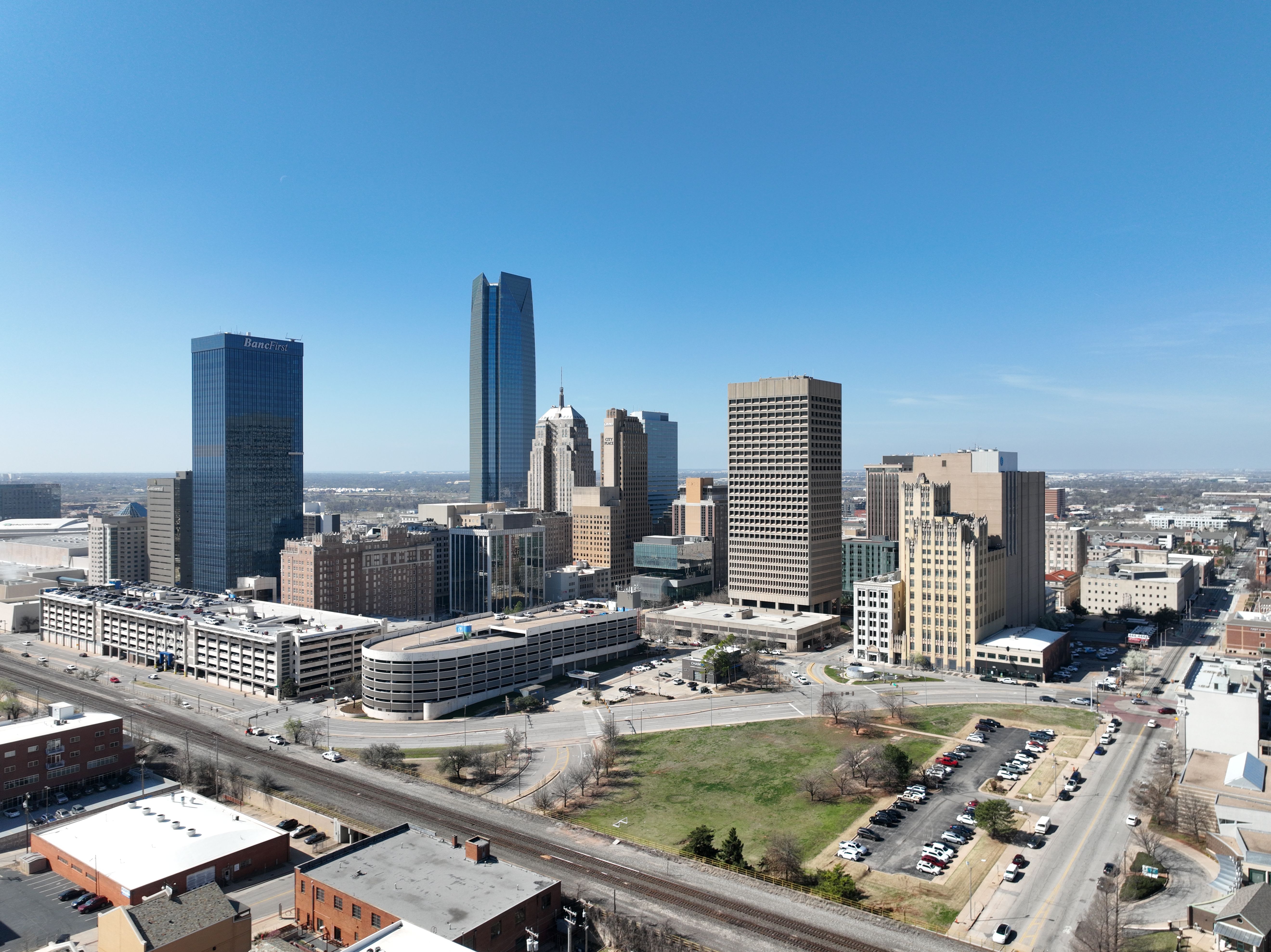 Oklahoma City downtown skyline with Devon Tower and modern buildings against blue sky